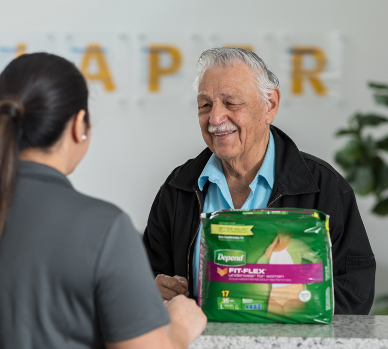 A mature man receiving incontinence products